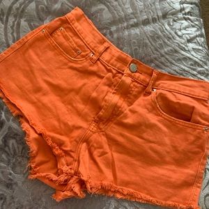 Orange high waisted shorts